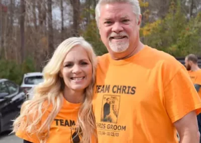 Suzanne Groom and Mike Groom Parents of Chris Groom with TEAM Chris tshirt on